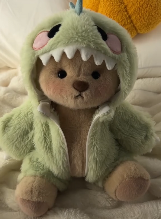 Ours en peluche dinosaure vert